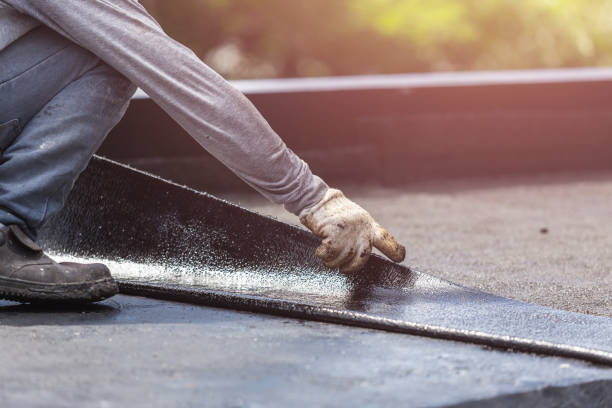 Professional Emergency Waterproofing technician working in Lake Odessa, MI